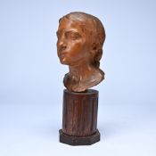 Alfred COURTENS (1889-1967), terracotta bust of a girl, signed