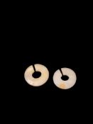 TWO WHITE OPAQUE JADE SLIT RING, China, Qing dynasty (1644-1911)