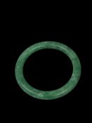 A JADEITE BANGLE, China, 19th century