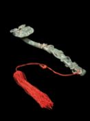 A MOTTLED JADE RUYI SCEPTER, China, Qing dynasty (1644-1911)