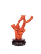 ☼A CARVED RED MOMO CORAL SCULPTURE, Japan, early 20th century