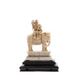 â˜¼AN IVORY SCULPTURE DEPICTING A SAGE ON AN ELEPHANT, China, 19th / 20th century