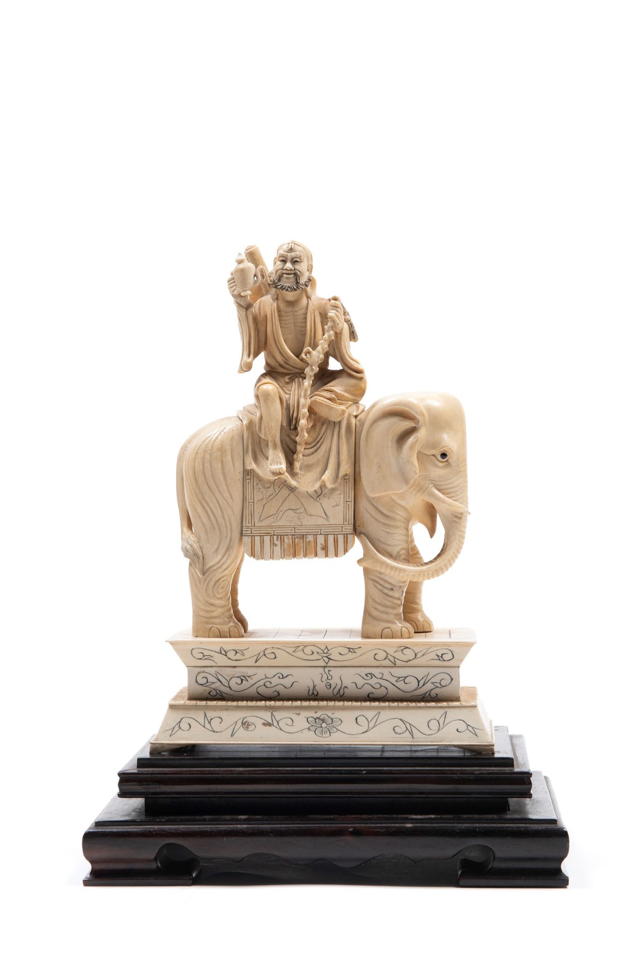 â˜¼AN IVORY SCULPTURE DEPICTING A SAGE ON AN ELEPHANT, China, 19th / 20th century
