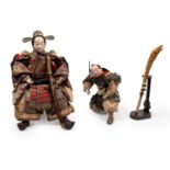 TWO DOLLS AND A SMALL KATANA, Japan, Meiji period (1868-1912)