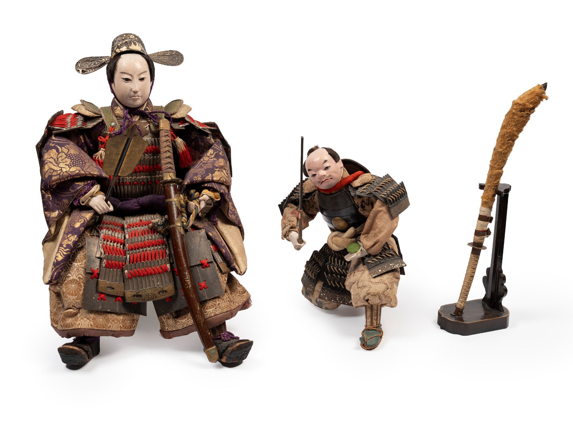TWO DOLLS AND A SMALL KATANA, Japan, Meiji period (1868-1912)