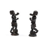 PAIR OF BRONZE PUTTI WITH DARK PATINA, 17th century