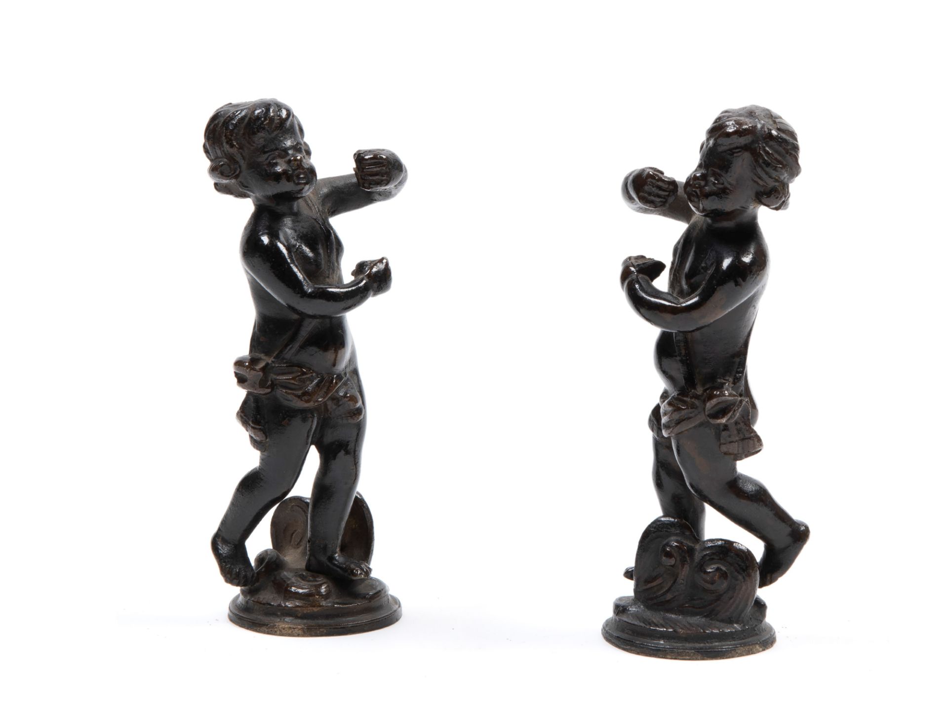 PAIR OF BRONZE PUTTI WITH DARK PATINA, 17th century