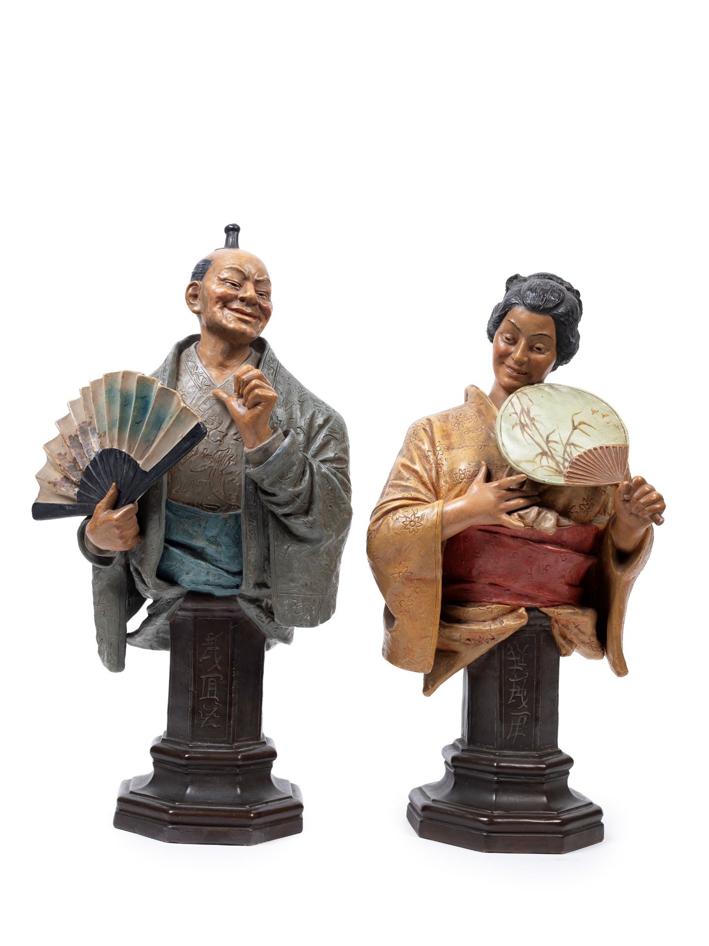 A PAIR OF POLYCHROME TERRACOTTA SCULPTURES, Early 20th century