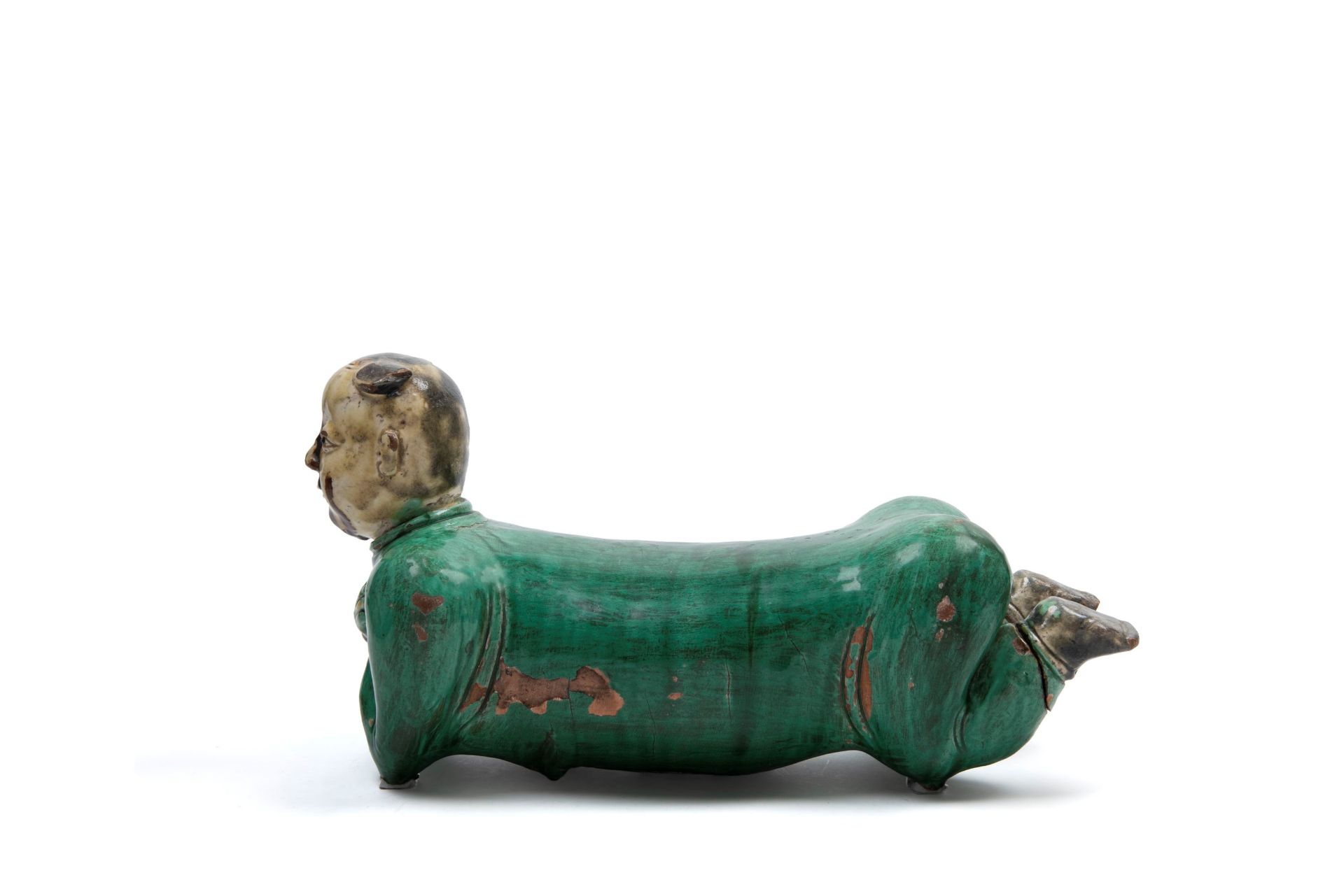 POLYCHROME SANCAI CERAMIC SCULPTURE DEPICTING A RECLINING CHILD, China, late 19th / early 20th centu