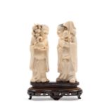 â˜¼TWO IVORY SCULPTURES DEPICTING HEHE TWINS, China, early 20th century