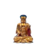 LACQUERED AND GILDED WOOD SCULPTURE DEPICTING A SEATED BUDDHA, China, early 20th century