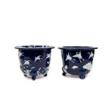 PAIR OF WHITE AND BLUE PORCELAIN CACHEPOTS, Japan, Meiji period (1868-1912)
