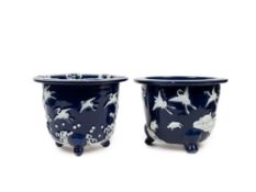 PAIR OF WHITE AND BLUE PORCELAIN CACHEPOTS, Japan, Meiji period (1868-1912)