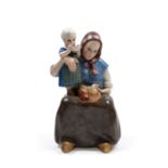 Polychrome earthenware sculpture depicting a girl with a doll, Turin, 20th century