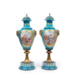 A ORMOLU MOUNTED PAIR OF PORCELAIN VASES, France, 19th century