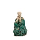 A PORCELAIN GUANYIN , China, 20th century