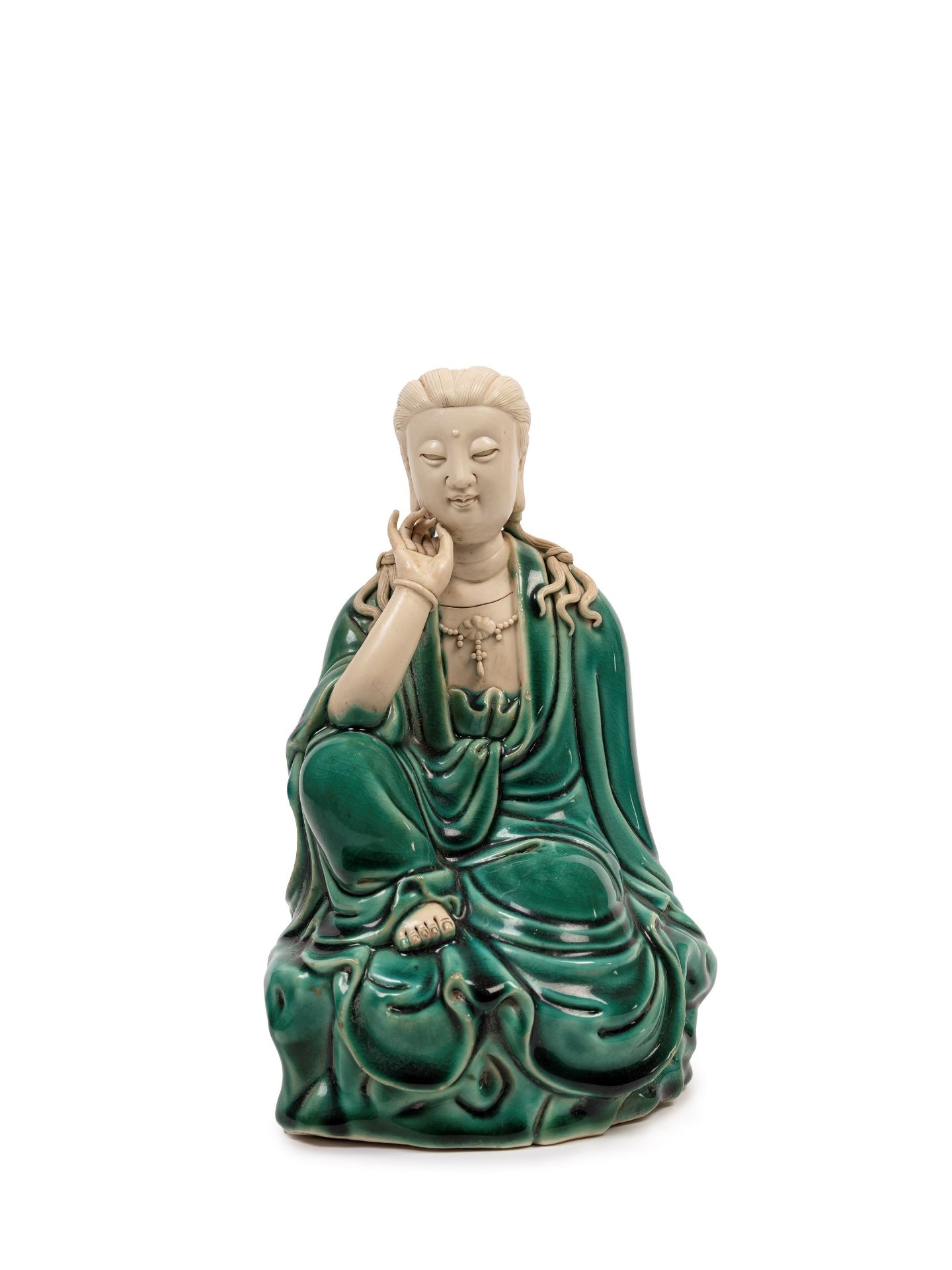 A PORCELAIN GUANYIN , China, 20th century