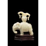 A SERPENTINE FIGURE OF AN ELEPHANT, China, 19th / 20th century