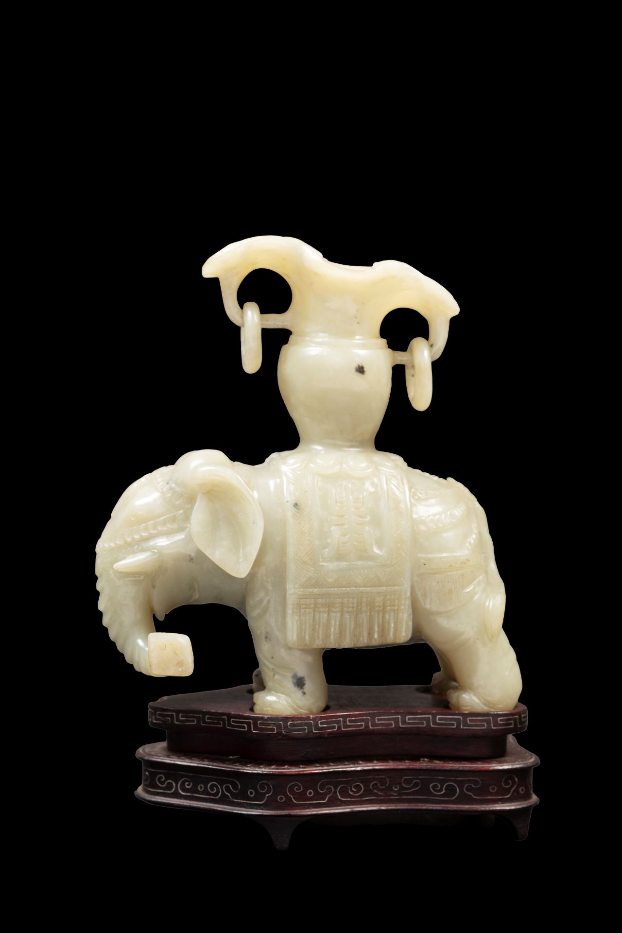 A SERPENTINE FIGURE OF AN ELEPHANT, China, 19th / 20th century