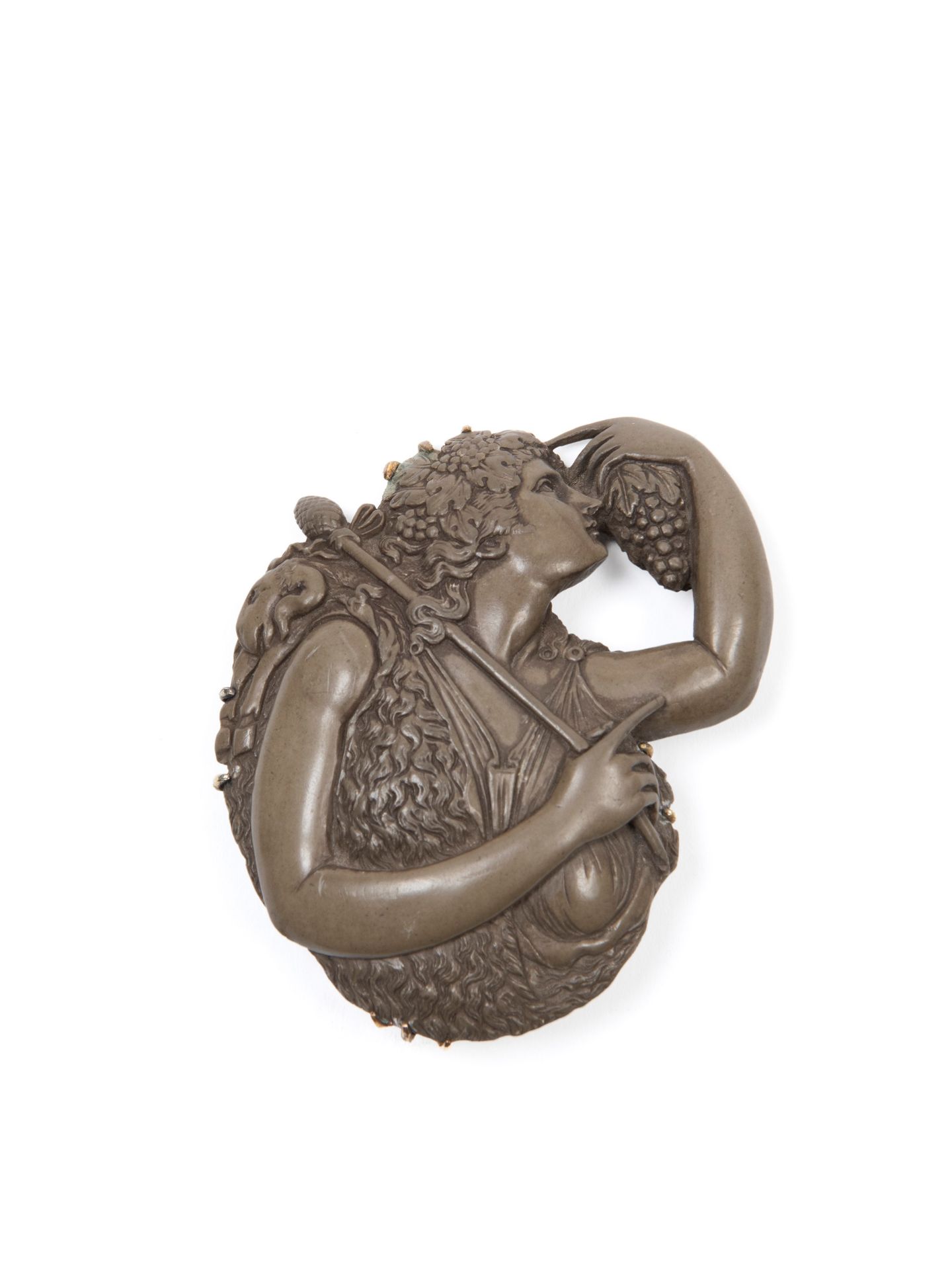 LAVA STONE CAMEO BROOCH DEPICTING A BACCHANTE WITH THYRSUS, Naples, early 19th century