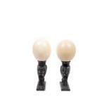 PAIR OF CERAMIC SPHINXES WITH OSTRICH EGGS, 19th century