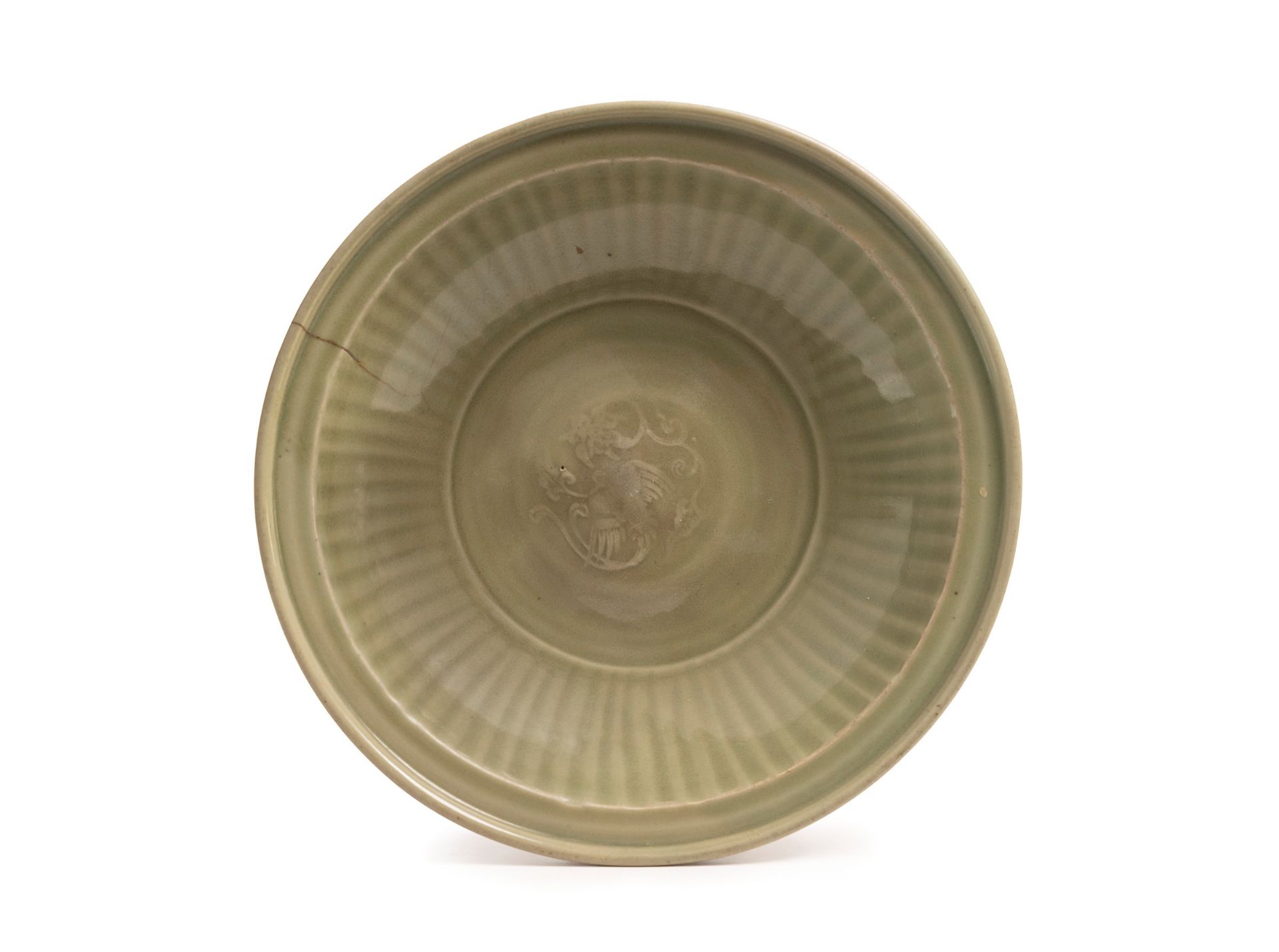 A CELADON PLATE, China, Ming Dynasty (1368-1644)