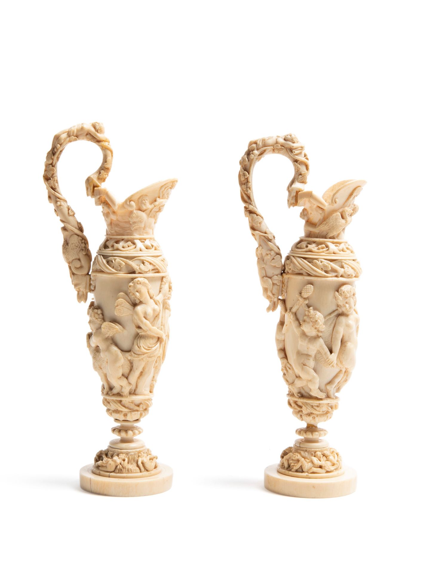 â˜¼A PAIR OF IVORY EWERS, Germany, 18/19th century