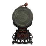 A GONG WITH DRUMSTICK AND STAND IN WOOD, China, possibly Han (206 b.C-220 a.d.)