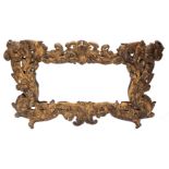BAROQUE OVERDOOR MIRROR IN GILDED IRON, 17th century