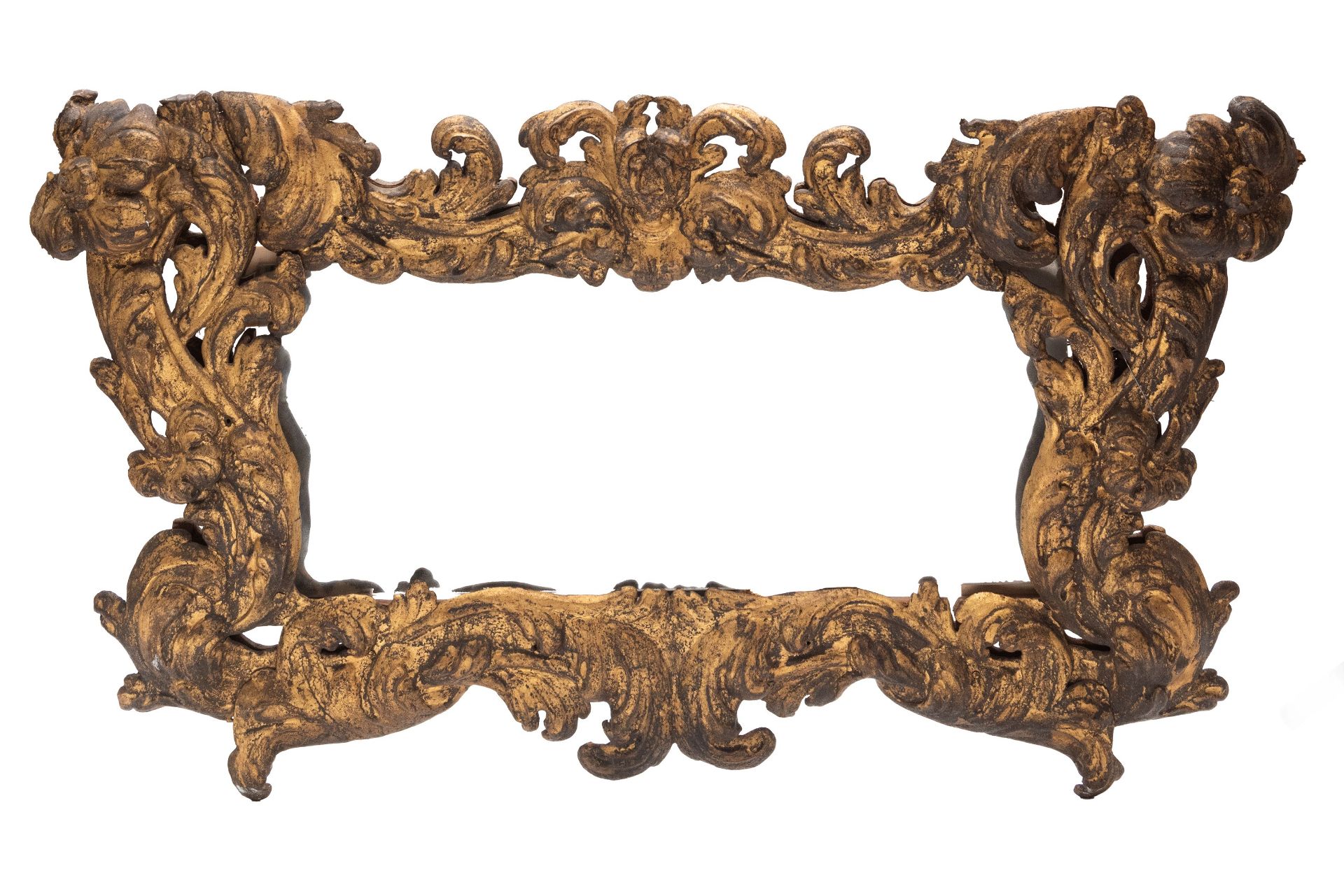 BAROQUE OVERDOOR MIRROR IN GILDED IRON, 17th century