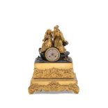 CHARLES X MANTEL CLOCK IN GILT AND DARK-PATINATED BRONZE, France, 19th century