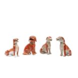 FOUR PORCELAIN FIGURES OF DOGS, China, Qing dynasty, 18th century