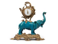 TABLE CLOCK WITH PORCELAIN ELEPHANT MOUNTED IN BRONZE, China, Qing dinasty, 19th century