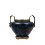 A LARGE PORCELAIN BOWL MOUNTED IN GILT BRONZE, France, 19th / 20th century