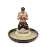 POLYCHROME EARTHENWARE SCULPTURE DEPICTING FAUN PLAYING ON A PLATE, Turin, 20th century