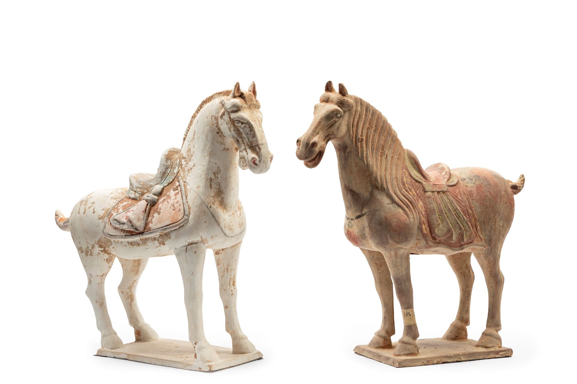 A PAIR OF CHINESE TERRACOTTA HORSES IN TANG STYLE,