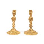 A PAIR OF GILT BRONZE CANDLESTICKS IN THE LOUIS XV STYLE., 19th century