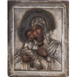 ICON WITH SILVER RIZA DEPICTING MADONNA AND CHILD, Russia, late 19th century