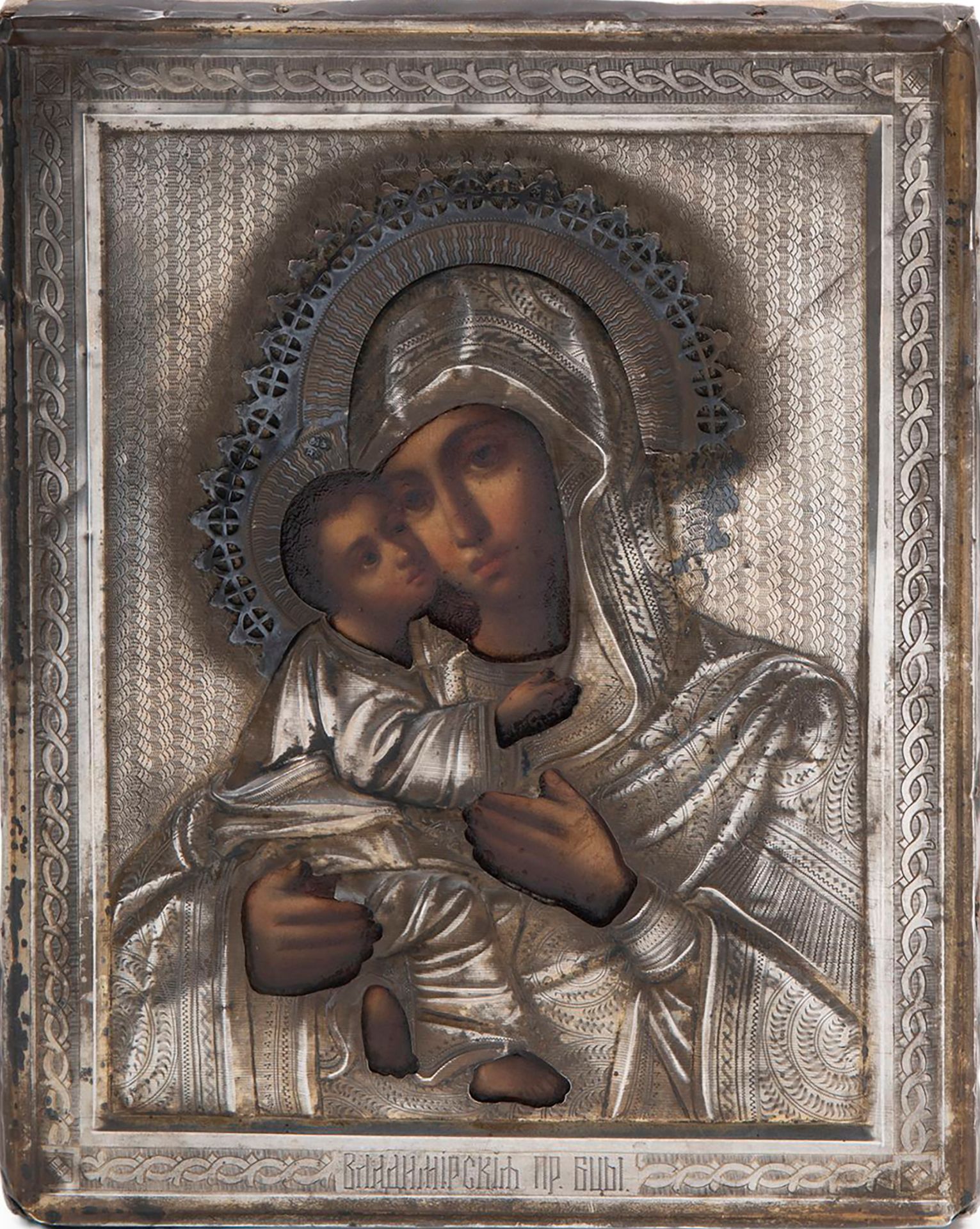 ICON WITH SILVER RIZA DEPICTING MADONNA AND CHILD, Russia, late 19th century
