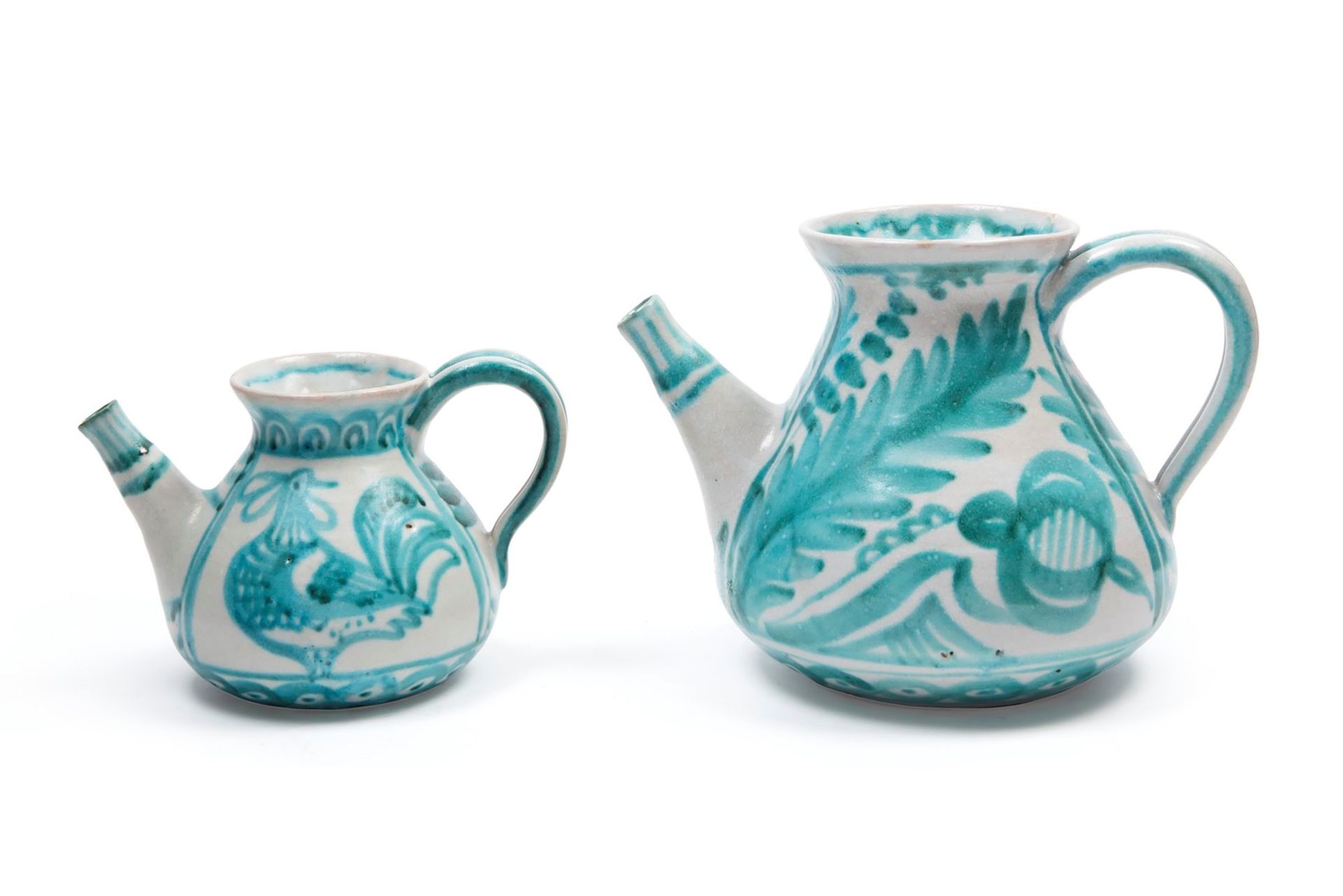 TWO WHITE AND GREEN MAIOLICA EWERS, Vietri, 20th century
