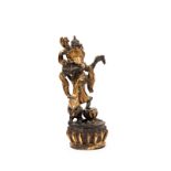 A BRONZE FIGURE OF GANESHA, Himalaya, 19th