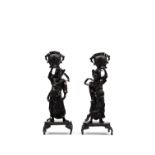 Pair of bronze sculptures with dark patina depicting male figures, Japan, Meiji period (1868-1912)