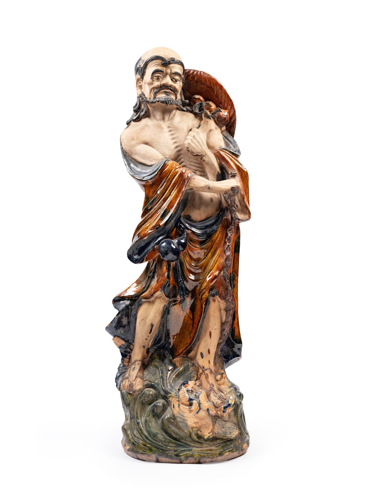 A HUGE SHIWAN CERAMIC FIGURE OF A LUOHAN, China, Qing dynasty (1644-1911)