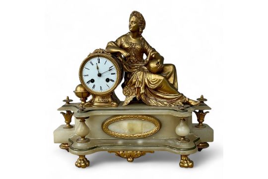 A late 19thC Neoclassical style alabaster and gilt metal clock, with a reclining lady holding - Image 1 of 6