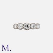 A Diamond Five Stone Ring in 18k yellow gold, set with five old cut diamonds totalling approximately