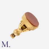 A Carnelian Fob Seal, in yellow gold, with detailed engraving and wirework to the mount. Unmarked