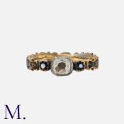 An Antique Georgian Rock Crystal And Enamel Mourning Ring in yellow gold, set with a principal