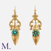A Pair of Victorian Turquoise Earrings in yellow gold, with ornate wire-work depicting a forget-me-