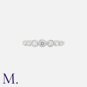 A Platinum and Diamond Jazz Ring by Tiffany & Co. There is an estimated total diamond weight of 0.32