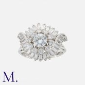 A Diamond Cluster Ring in white gold, comprising a cluster of round cut diamonds, the principal